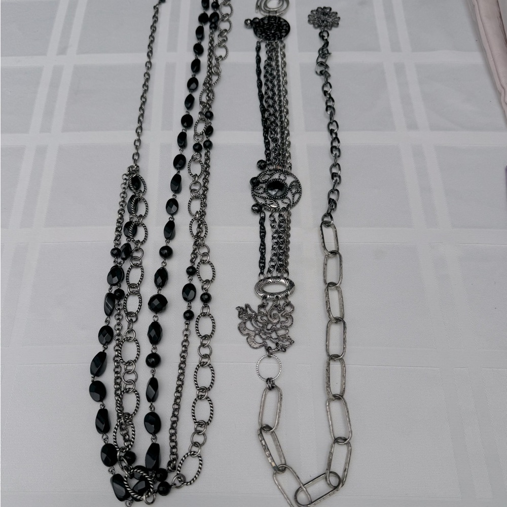 Bundle of two Chico’s women’s size small decorative silver and black chain belts